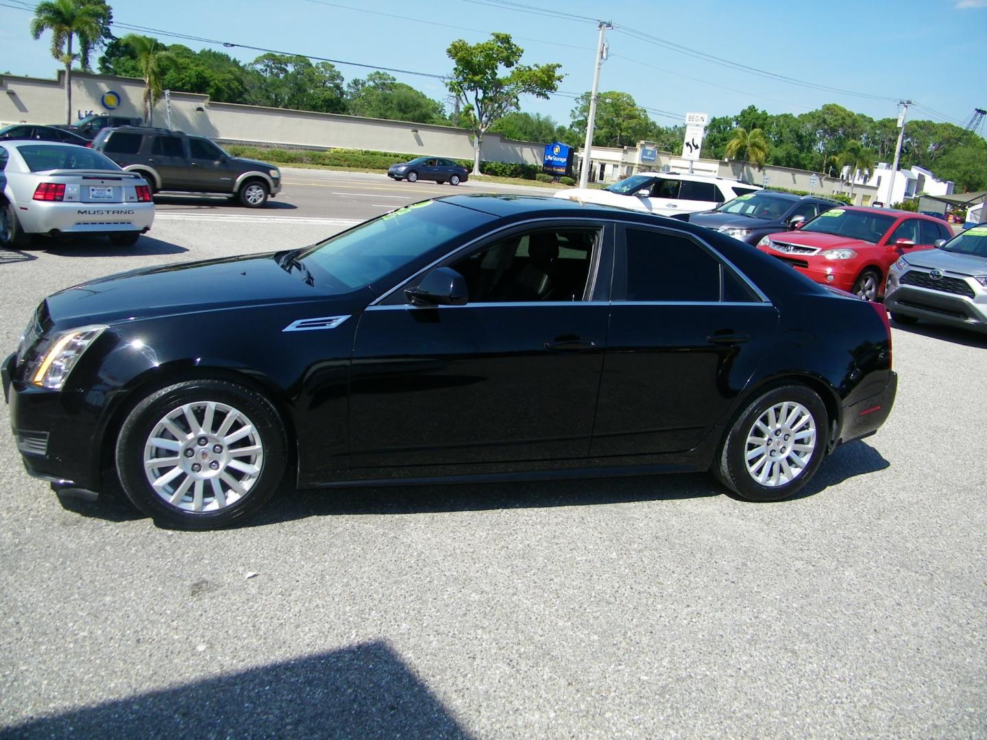 2010 Black /Black Cadillac CTS 3.0L Luxury AWD w/ Navi (1G6DH5EG7A0) with an 3.0L V6 DOHC 24V engine, 6-Speed Automatic transmission, located at 4000 Bee Ridge Road, Sarasota, FL, 34233, (941) 926-0300, 27.298664, -82.489151 - Photo#2